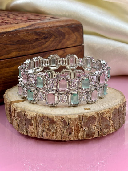 Ishhaara Multi Color CZ Kundan Bracelet - elegant silver bracelet with multi-color CZ stones on a wooden display