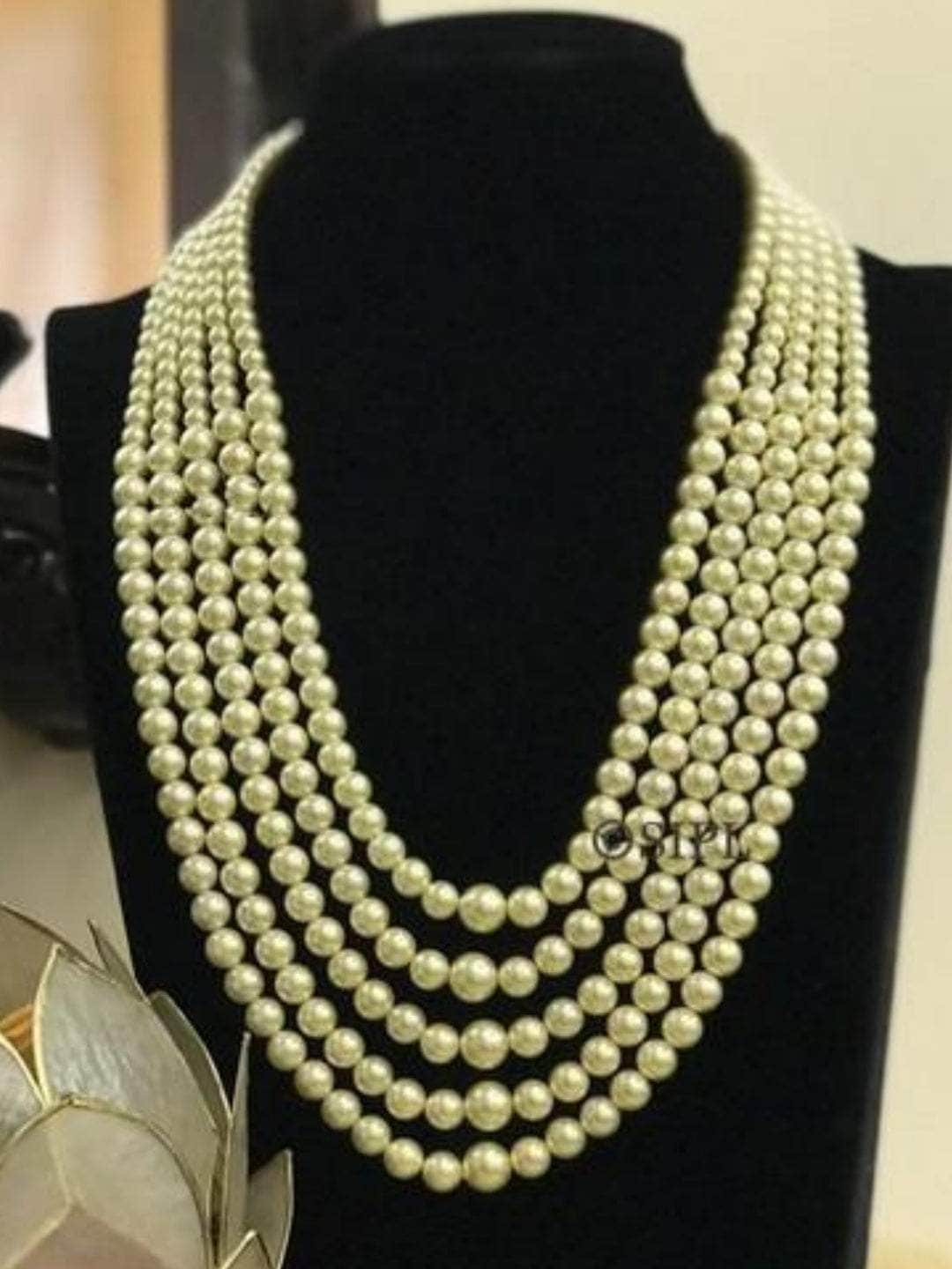 Ishhaara Multi Layered Shell Pearls Necklace