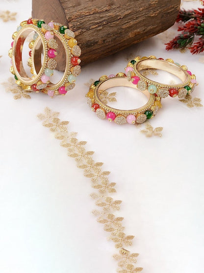Ishhaara Multicolored Beaded Gold Bangle Set - a close-up view of beautifully crafted gold bangles with multicolored beads - view 2