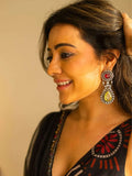 Ishhaara Nisha Aggarwal In Purple Statement Earring