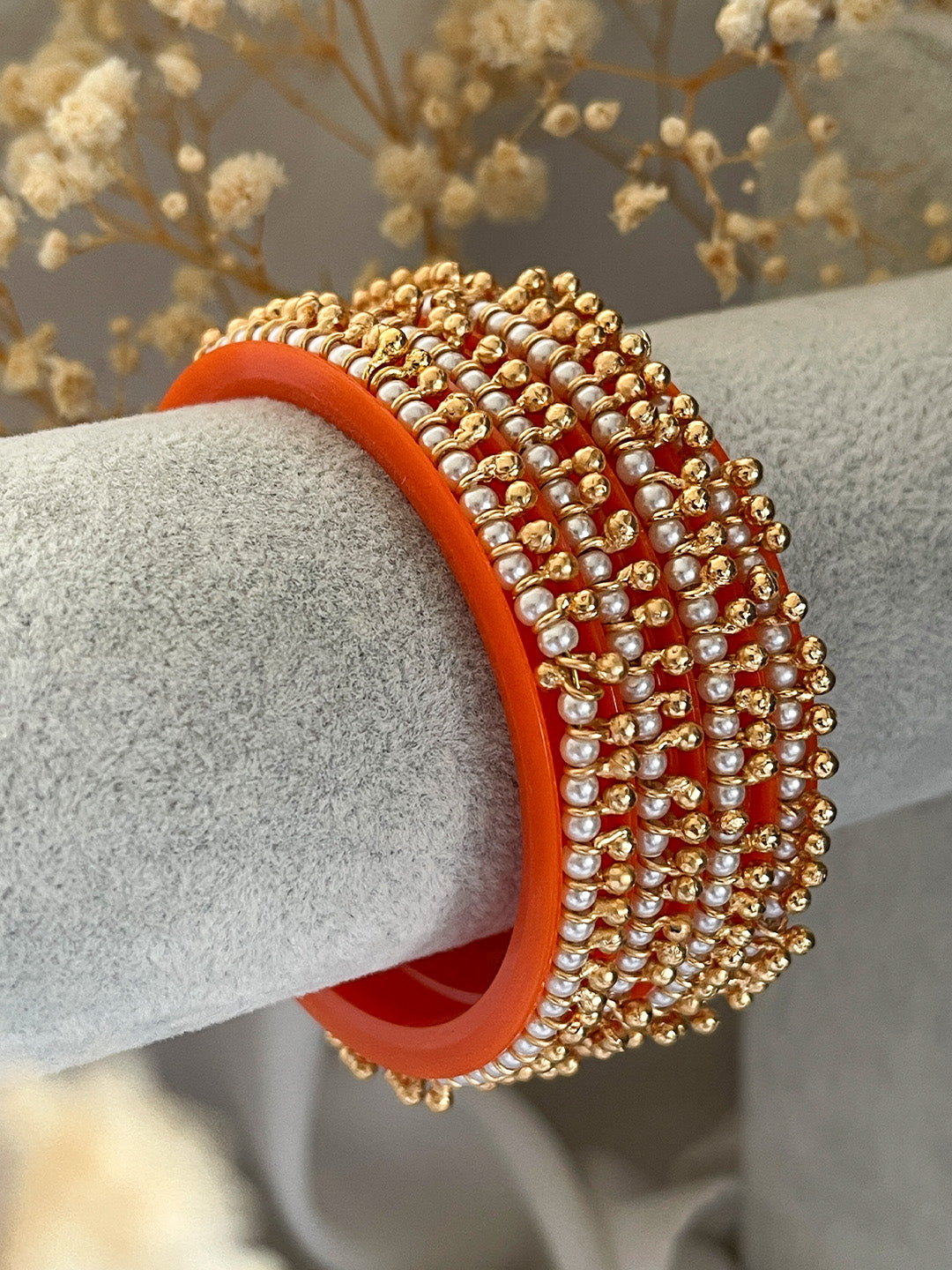 Ishhaara Orange Ghungroo And Pearl Studded Rajwadi Kada