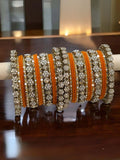 Ishhaara Orange Metal And Velvet Bangles With Mirror Work Bangles