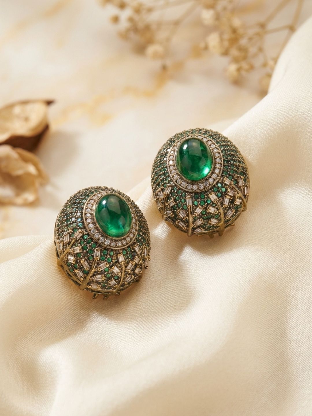 Ishhaara Oval Shaped Designer Earrings