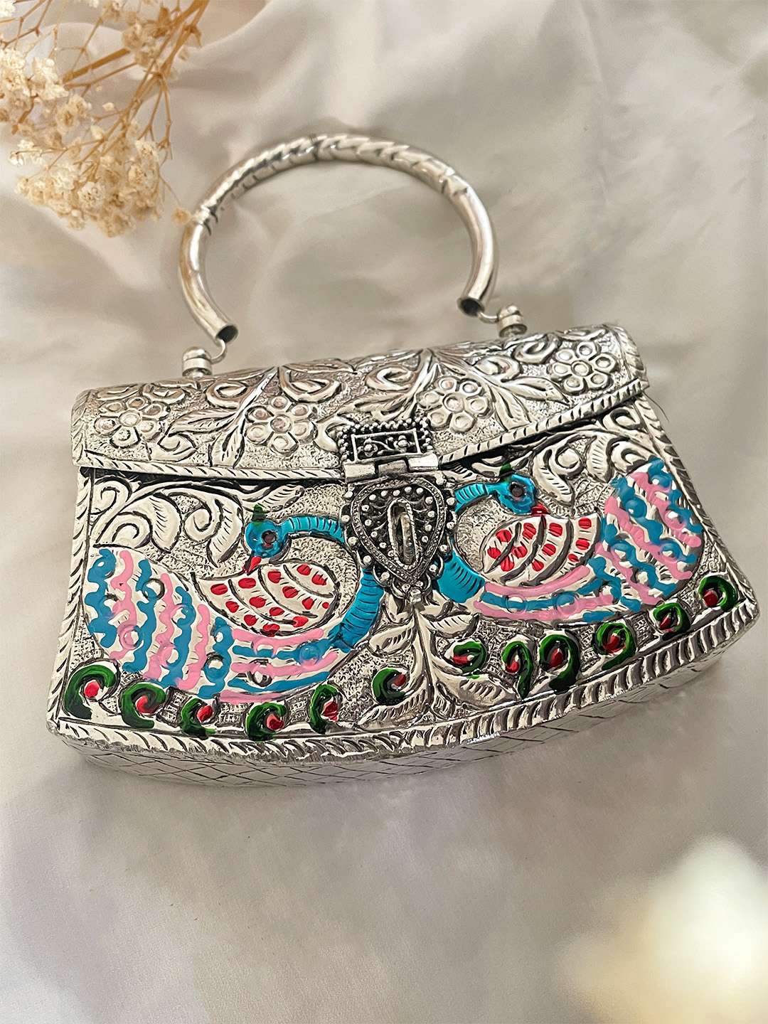 Ishhaara Peacock Designed Hand Carved Silver Clutch