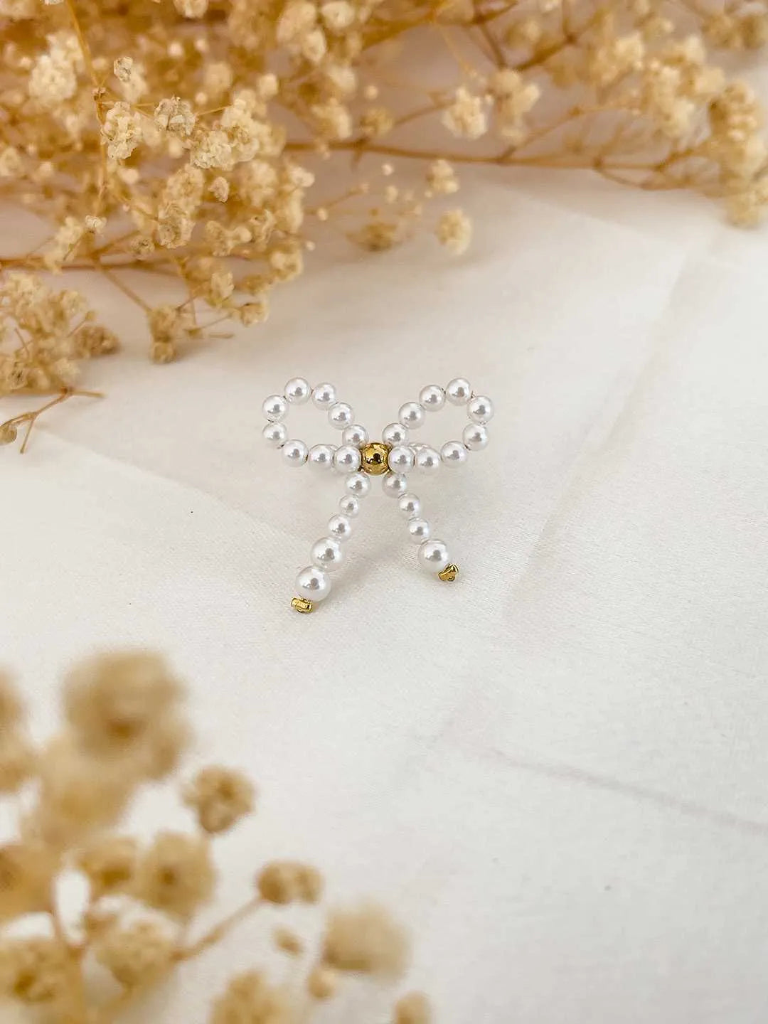 Ishhaara Pearl Studded Bow Ring