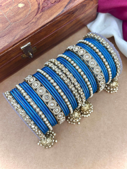 Ishhaara Pink Beaded Ethnic Bangle Set - A woman wearing a white top and pink beaded bangles - view 10