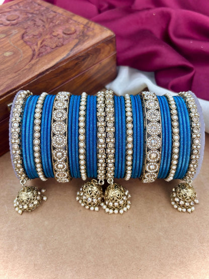 Ishhaara Pink Beaded Ethnic Bangle Set - A woman wearing a white top and pink beaded bangles - view 11