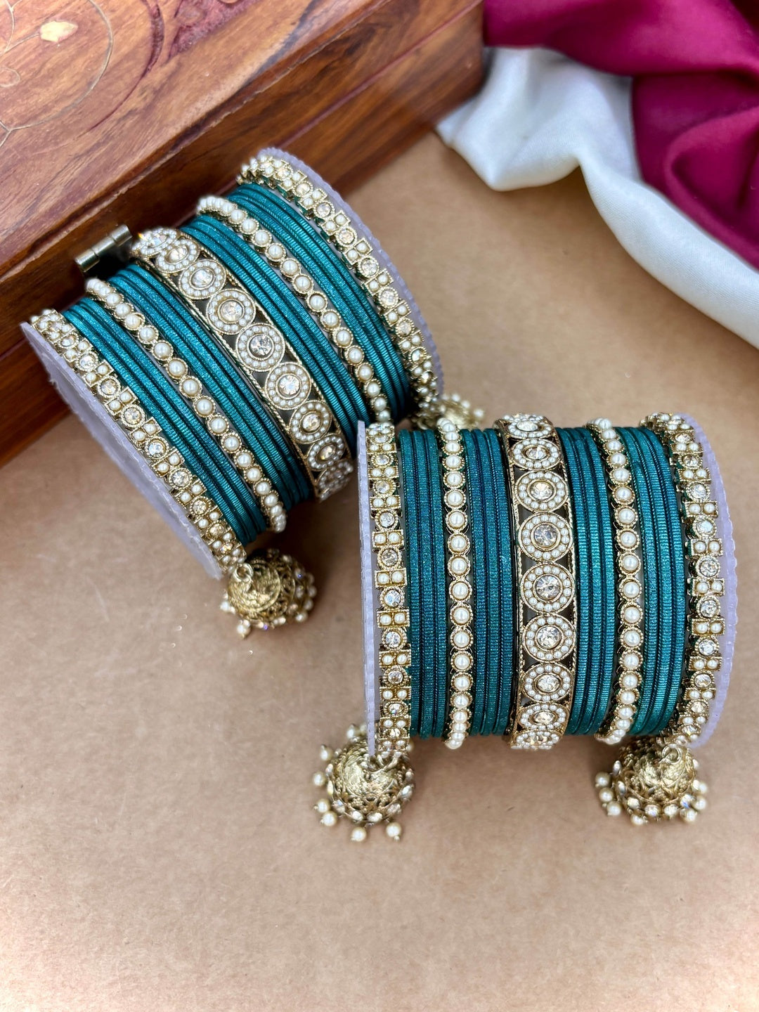 Ishhaara Pink Beaded Ethnic Bangle Set - A woman wearing a white top and pink beaded bangles - view 16