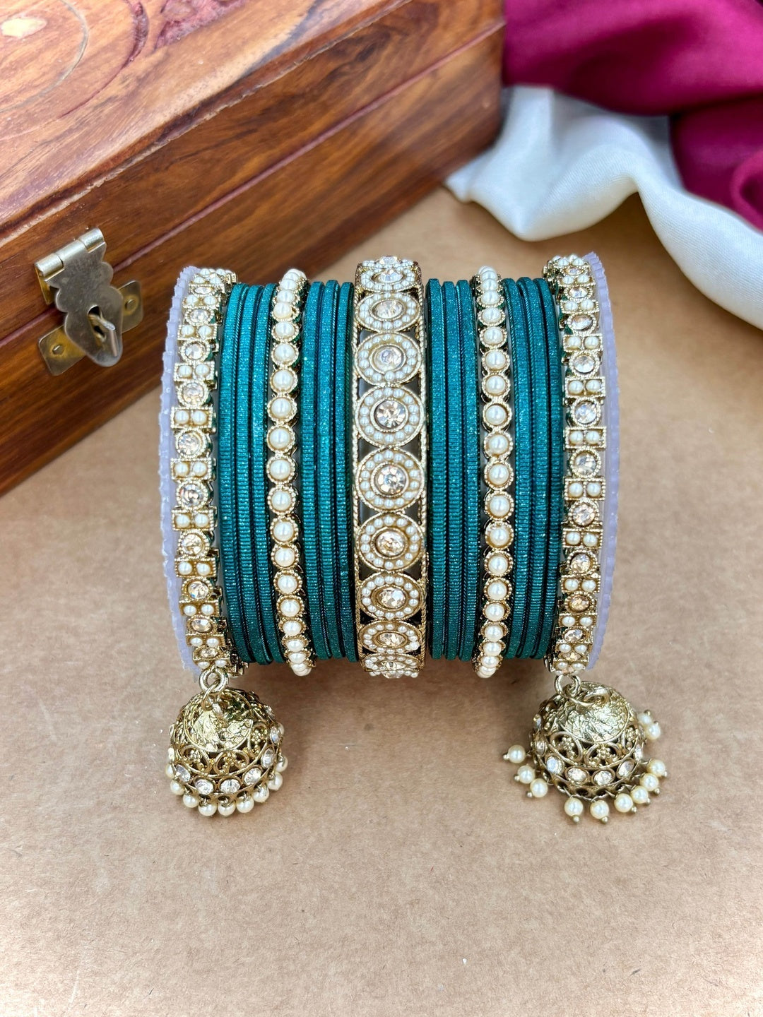 Ishhaara Pink Beaded Ethnic Bangle Set - A woman wearing a white top and pink beaded bangles - view 18