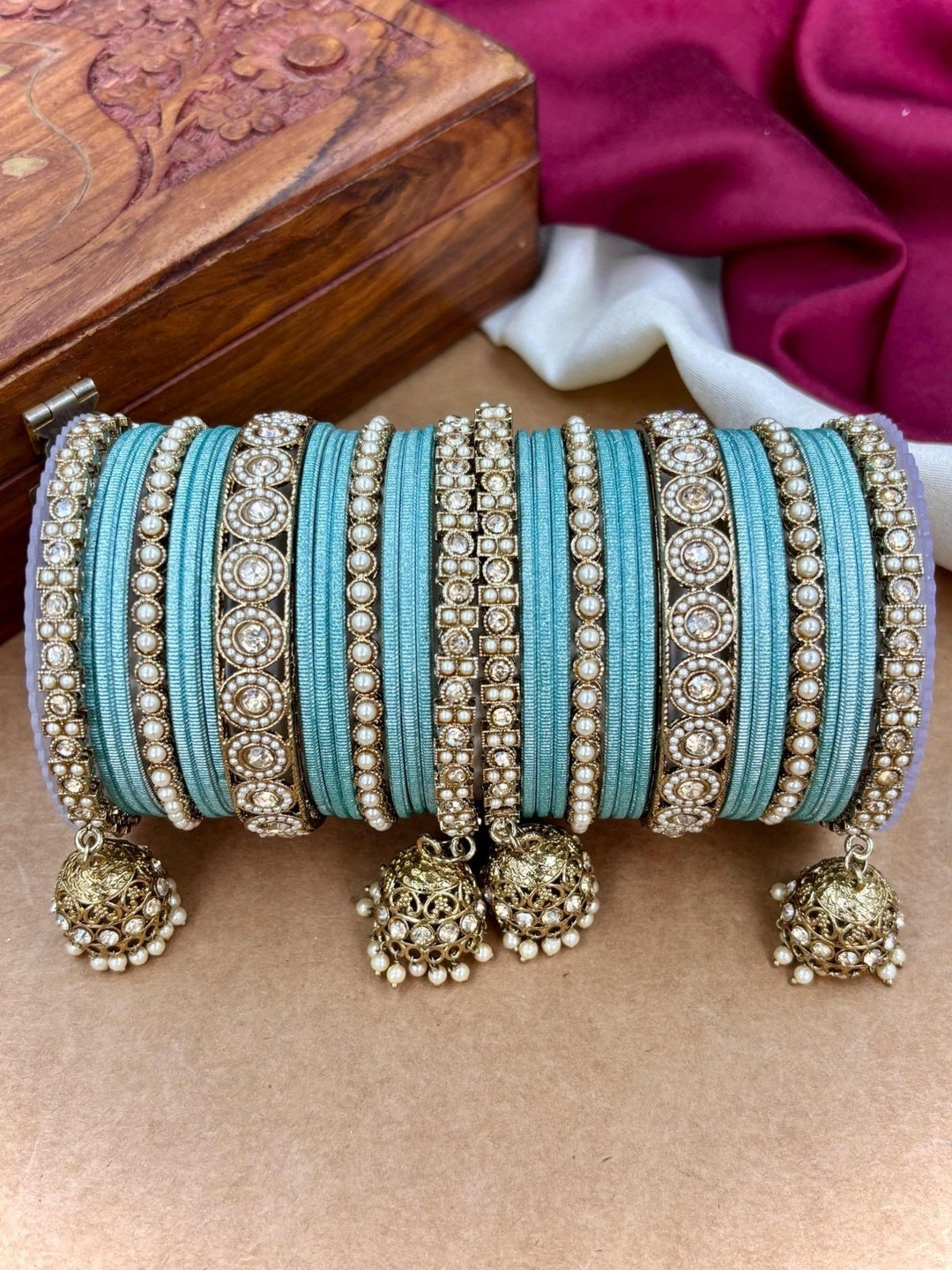 Ishhaara Pink Beaded Ethnic Bangle Set - A woman wearing a white top and pink beaded bangles - view 21