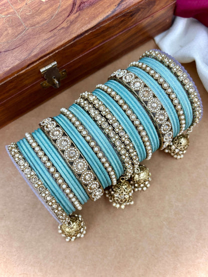 Ishhaara Pink Beaded Ethnic Bangle Set - A woman wearing a white top and pink beaded bangles - view 22
