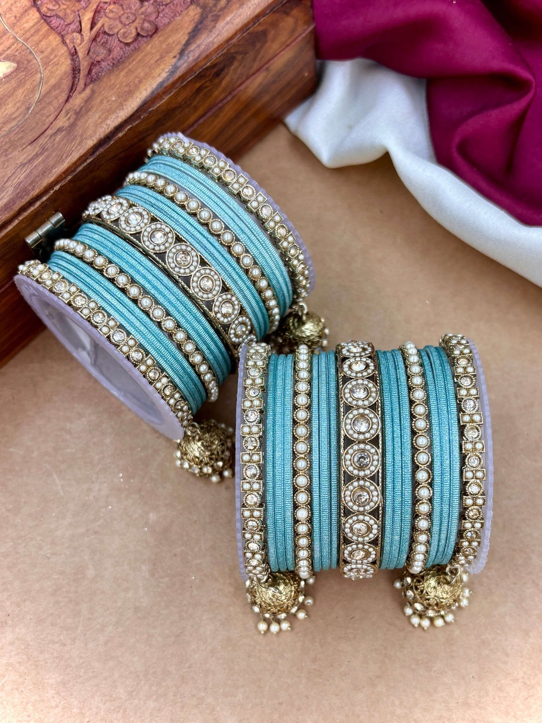 Ishhaara Pink Beaded Ethnic Bangle Set - A woman wearing a white top and pink beaded bangles - view 23