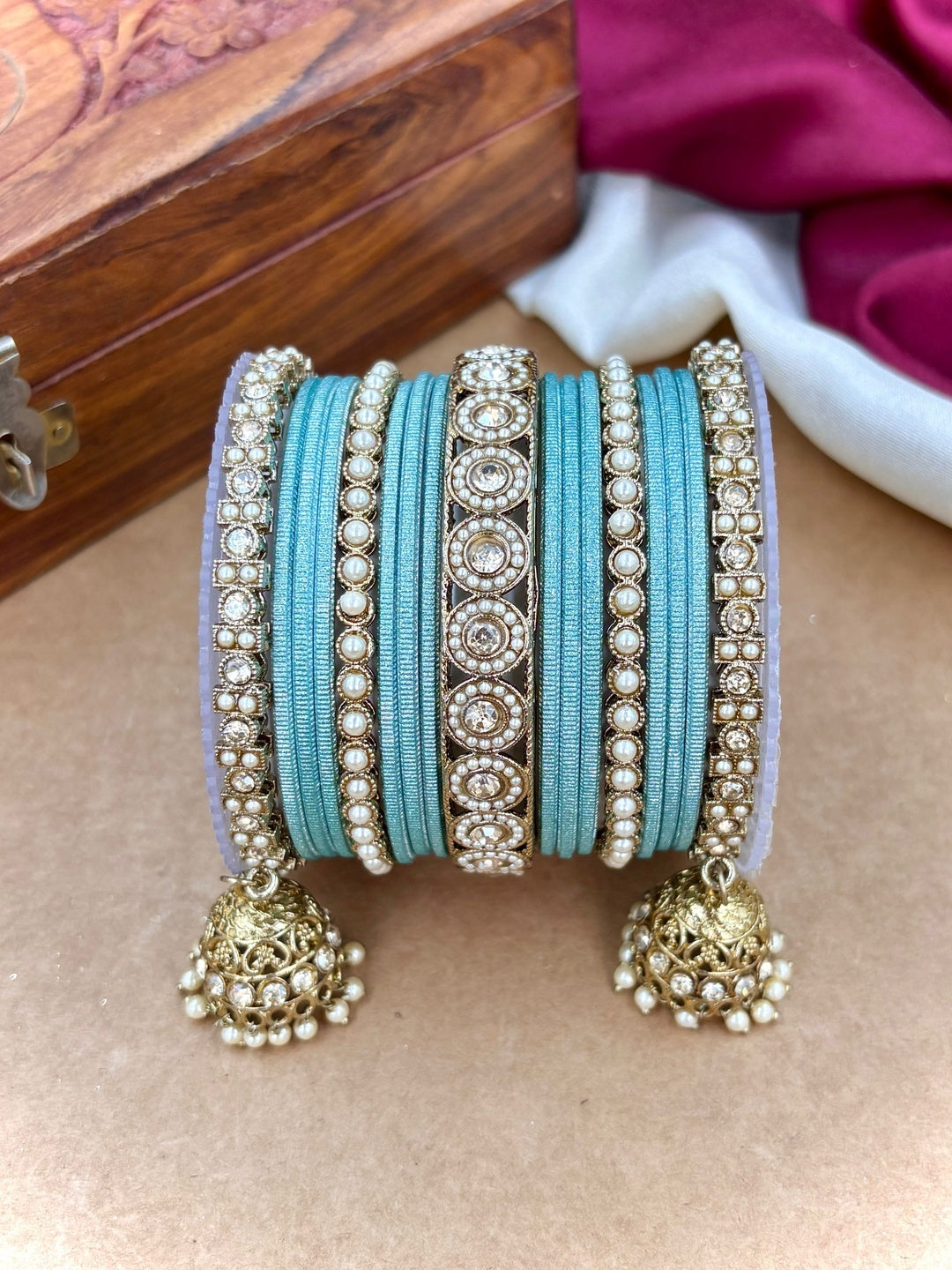 Ishhaara Pink Beaded Ethnic Bangle Set - A woman wearing a white top and pink beaded bangles - view 24