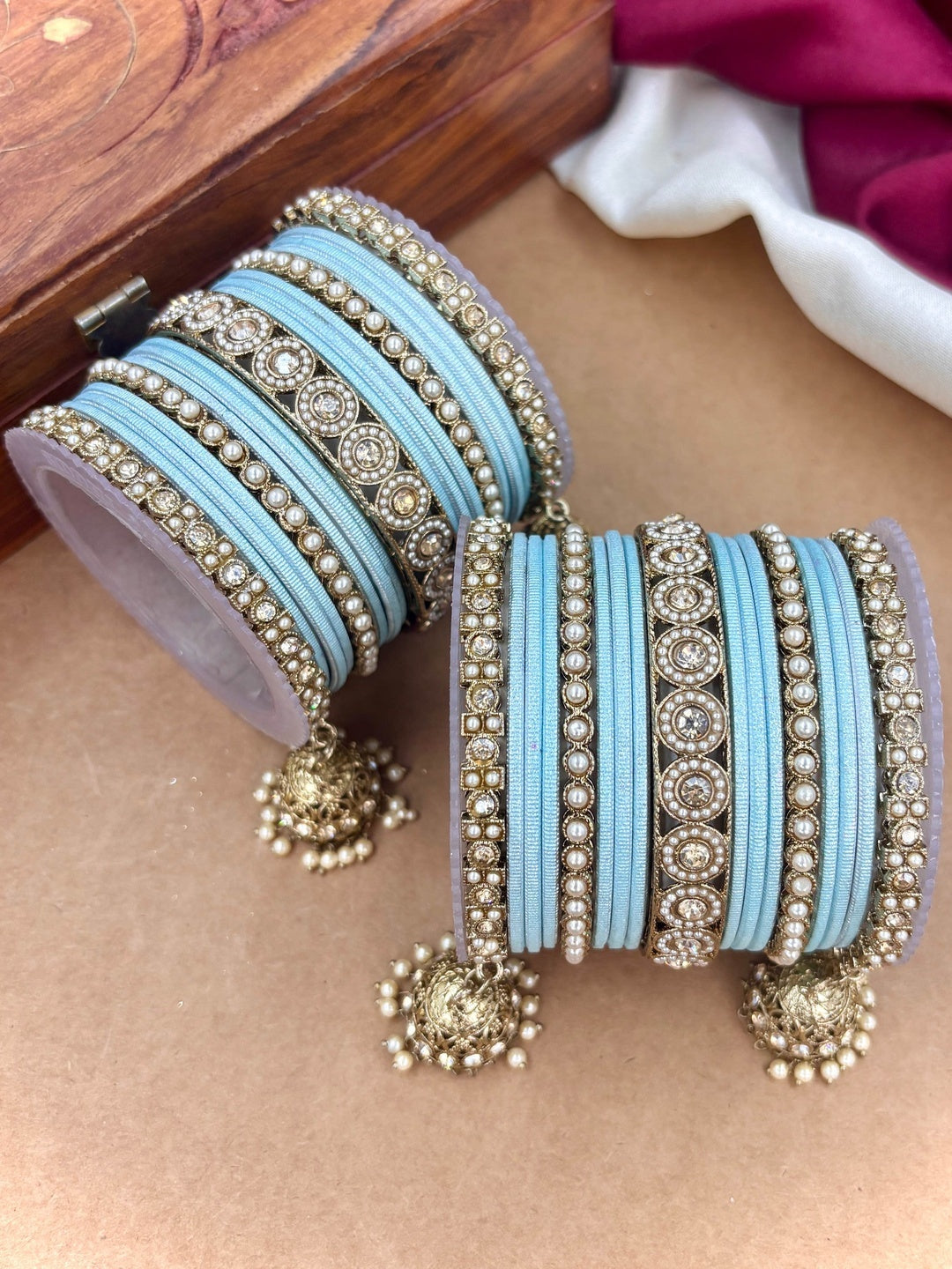 Ishhaara Pink Beaded Ethnic Bangle Set - A woman wearing a white top and pink beaded bangles - view 26