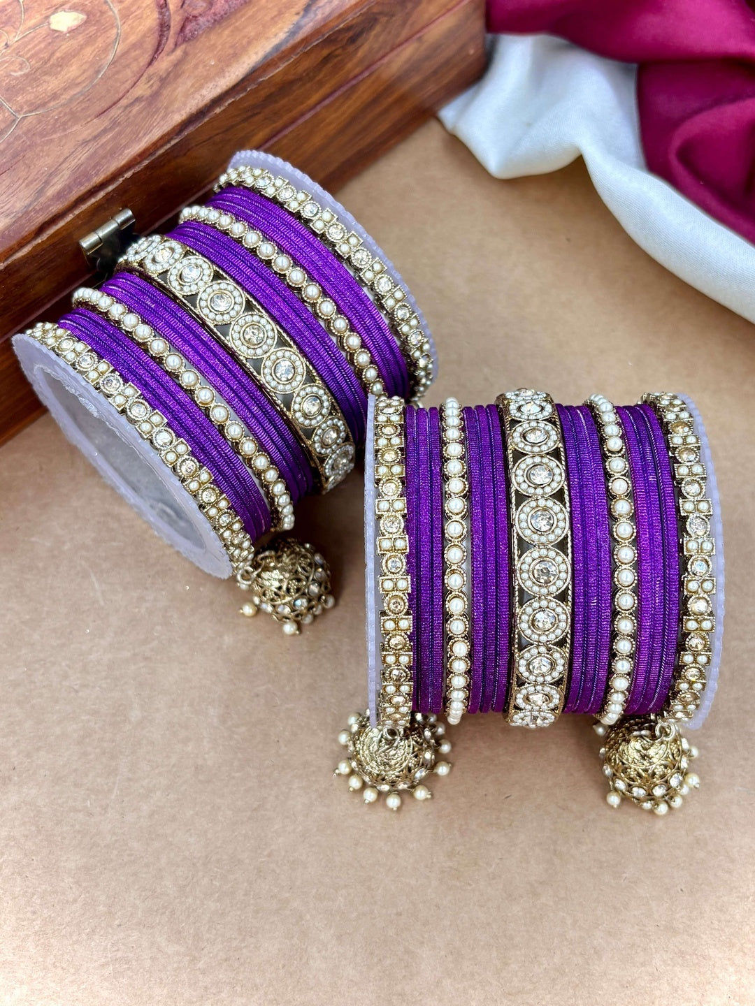 Ishhaara Pink Beaded Ethnic Bangle Set - A woman wearing a white top and pink beaded bangles - view 6