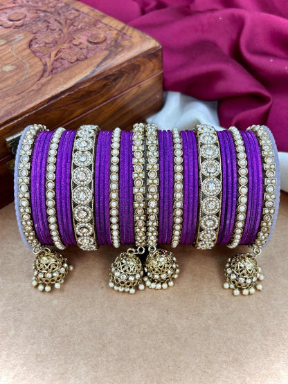 Ishhaara Pink Beaded Ethnic Bangle Set - A woman wearing a white top and pink beaded bangles - view 7
