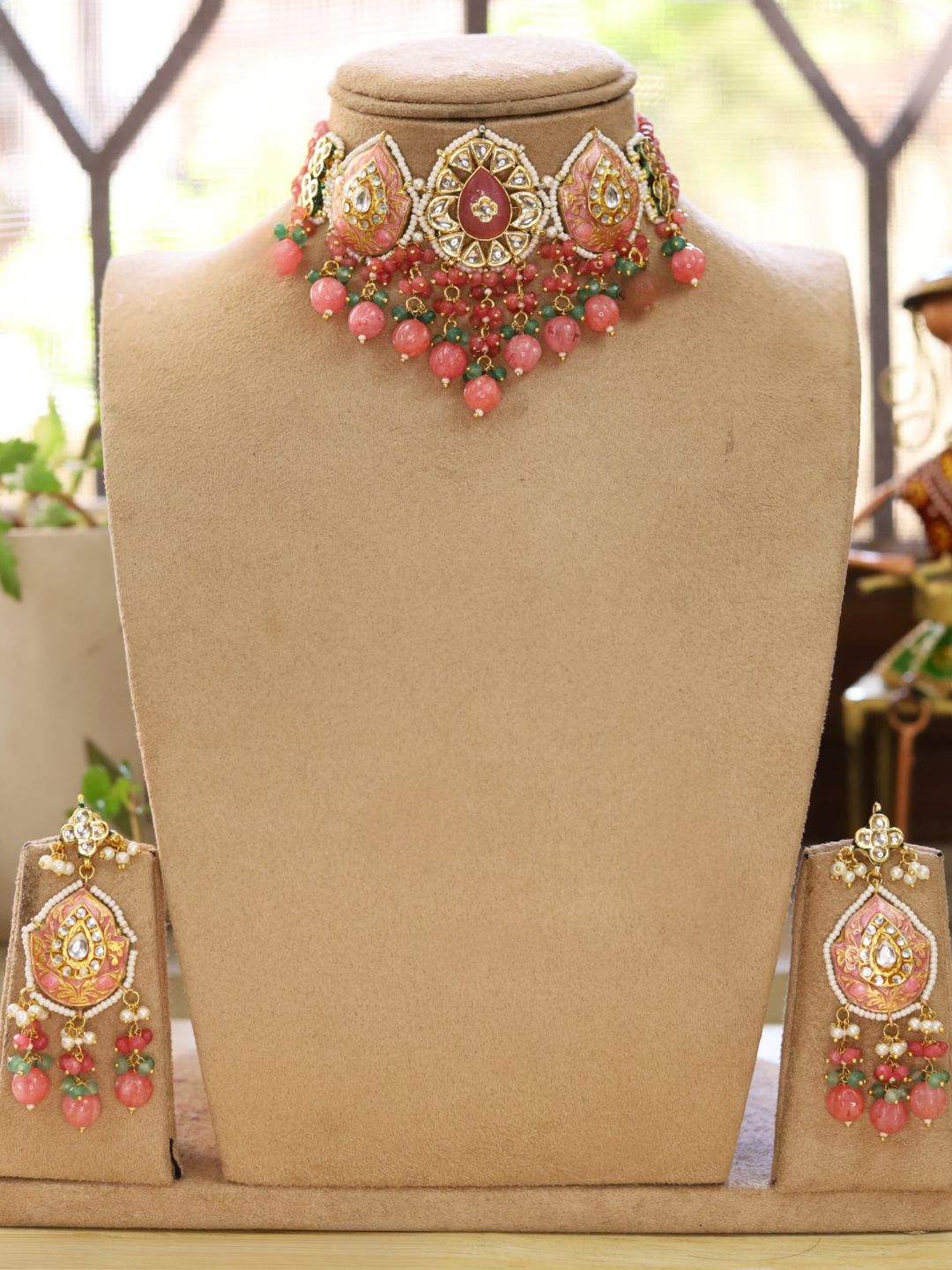 Ishhaara Pink Gold Plated Pearl Beaded Stone Studded Necklace And Earrings Set