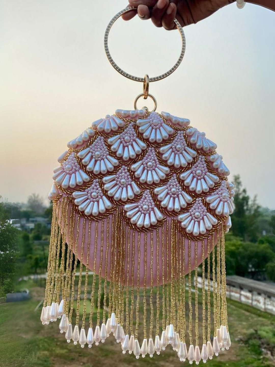 Ishhaara Pink Matka Embroidered Design In Round Clutch