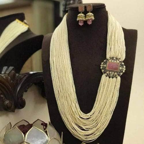 Ishhaara Pink Multi Layered Pearl Side Patch Necklace Set