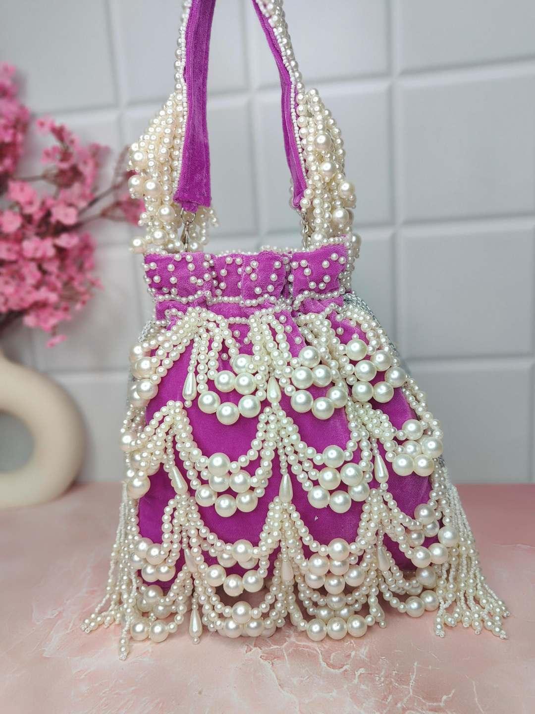 Ishhaara Pink Pearl Heavy Designer Potli