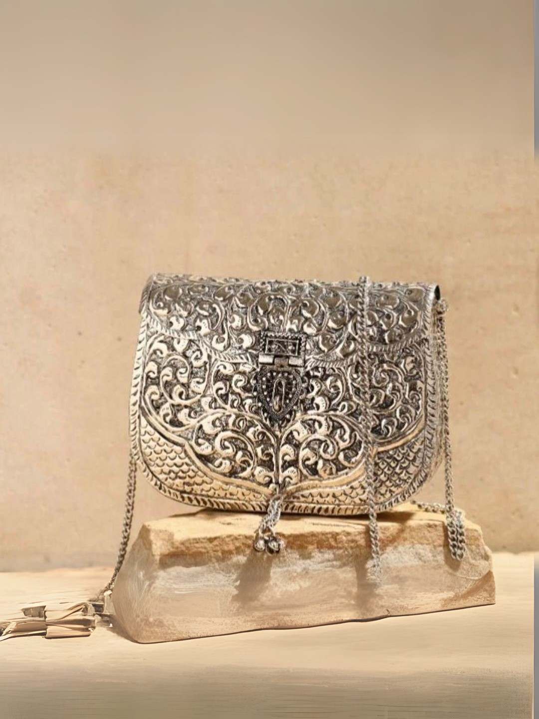 Ishhaara Pure Hand Carved Silver Metal Clutch