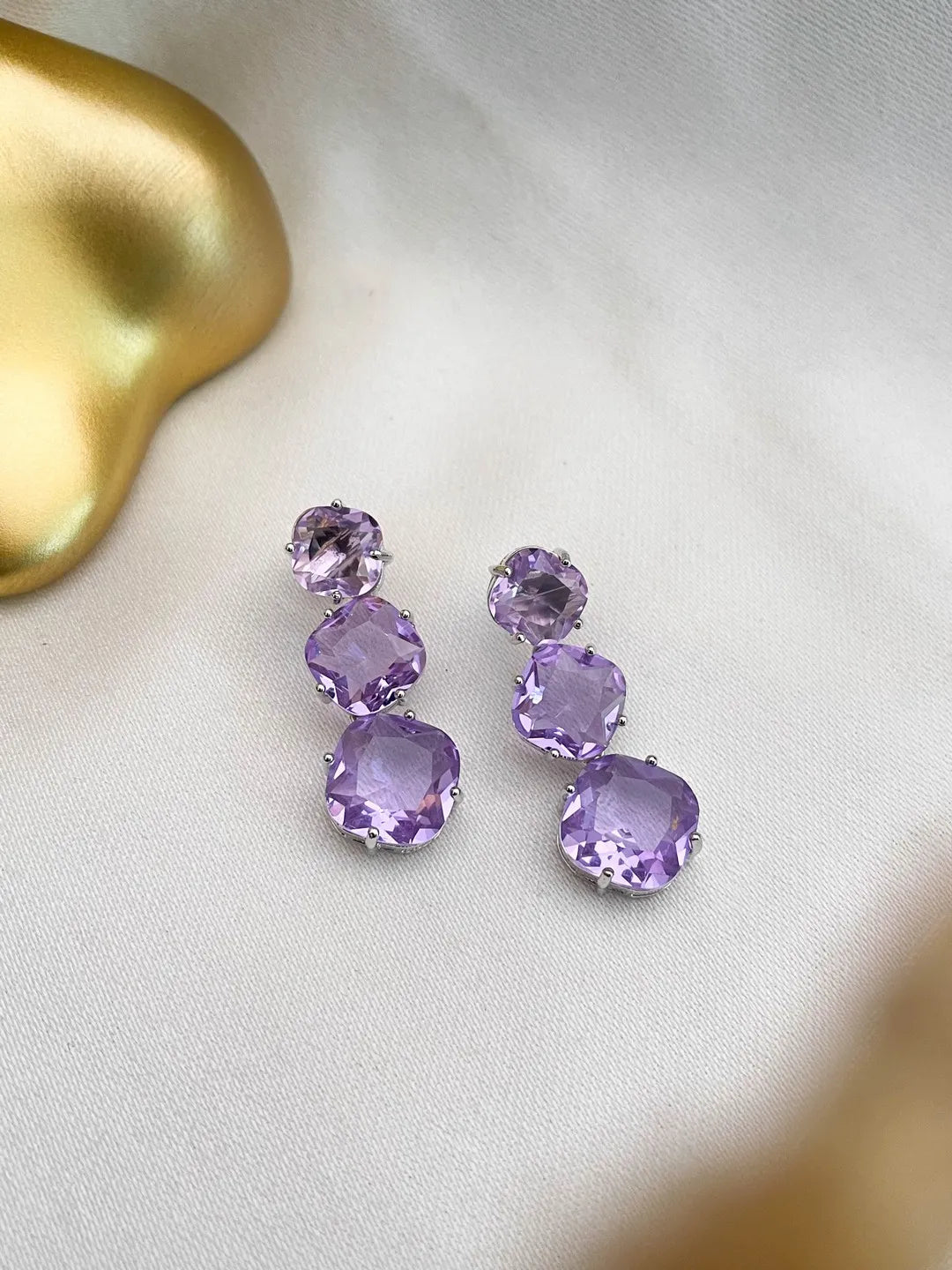 Ishhaara Purple Classic Stone Studded Earrings