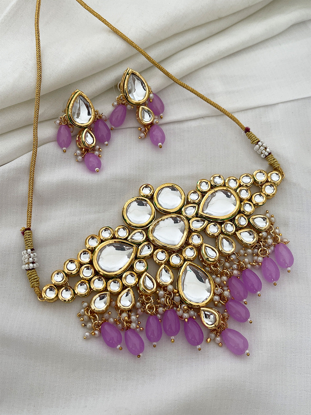 Ishhaara Purple Kundan Studded And Beaded Jewellery Set