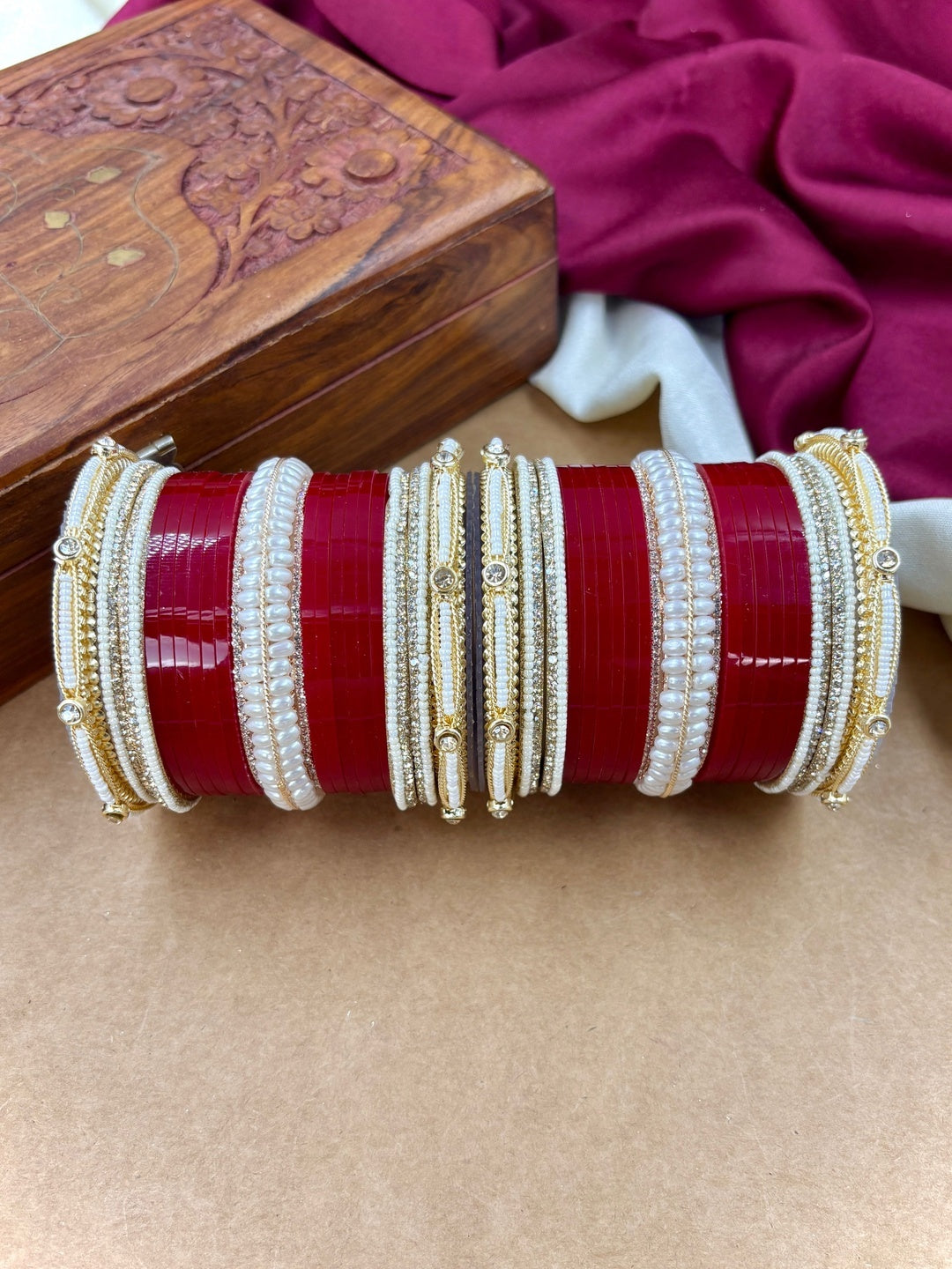 Ishhaara Red and White Bangle Set - A pair of intricately designed red and white bangles with gold accents - view 2