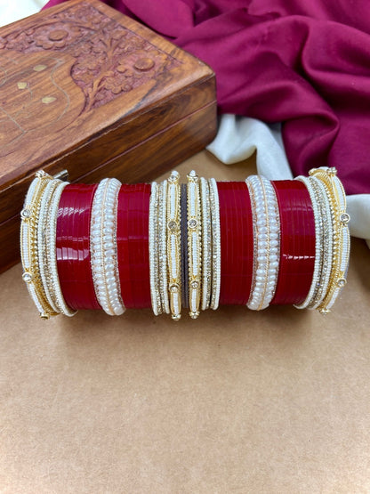 Ishhaara Red and White Bangle Set - A pair of intricately designed red and white bangles with gold accents - view 2