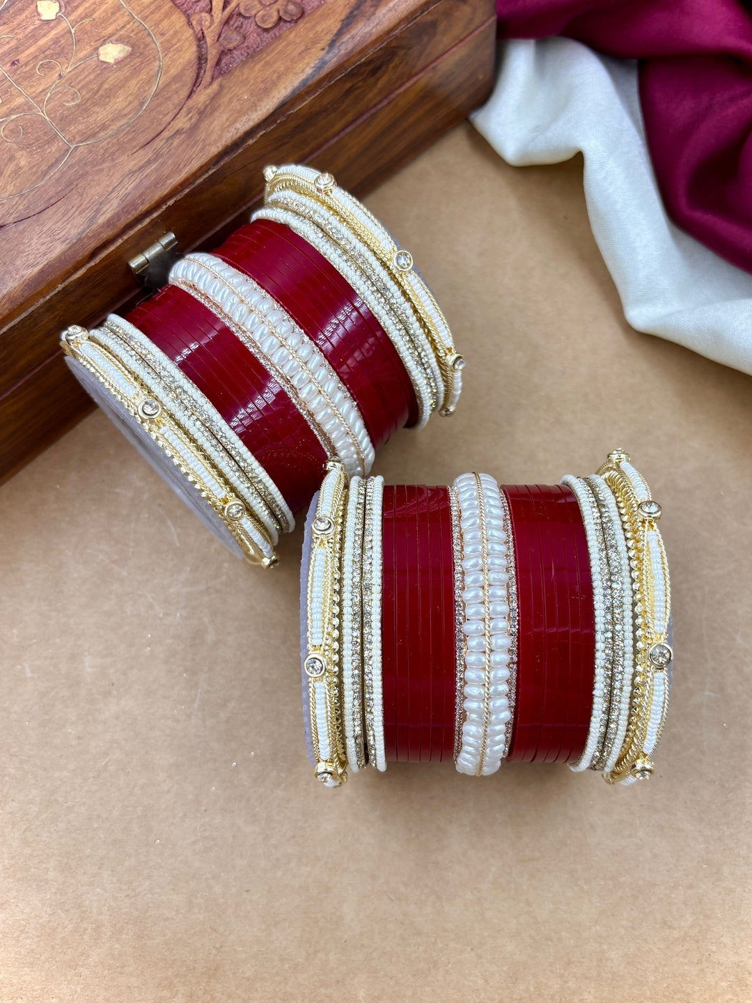 Ishhaara Red and White Bangle Set - A pair of intricately designed red and white bangles with gold accents - view 4