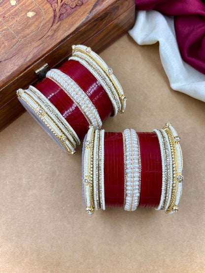 Ishhaara Red and White Bangle Set - A pair of intricately designed red and white bangles with gold accents - view 4