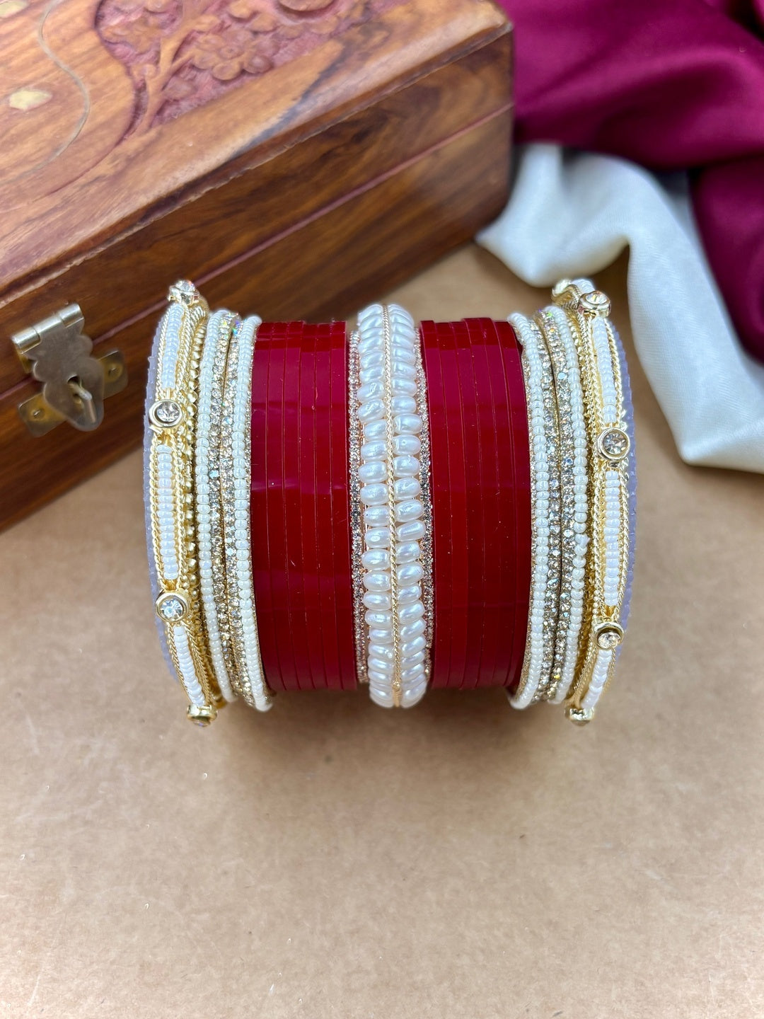 Ishhaara Red and White Bangle Set - A pair of intricately designed red and white bangles with gold accents - view 5