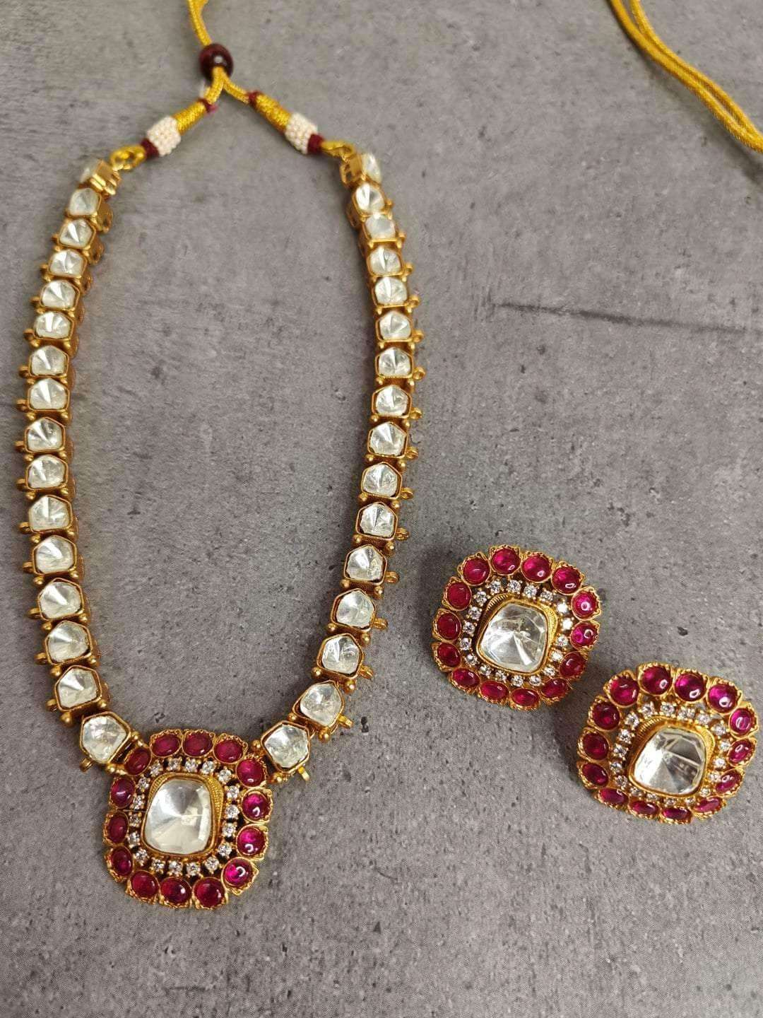 Ishhaara Red Color Kundan Necklace And Earring Set