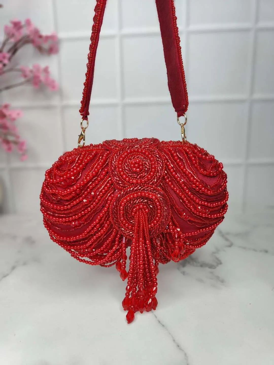 Ishhaara Red Embroidery Tassel Oval Beauty Clutches