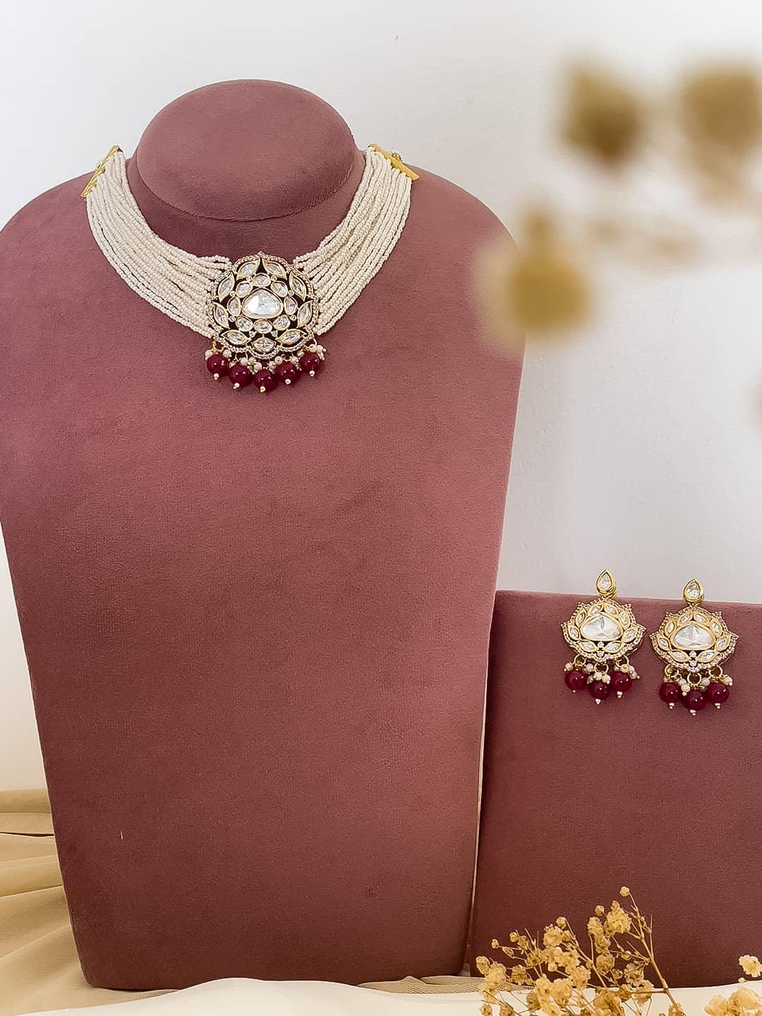 Ishhaara Red Gold Plated Kundan Stone Embellished Necklace Set