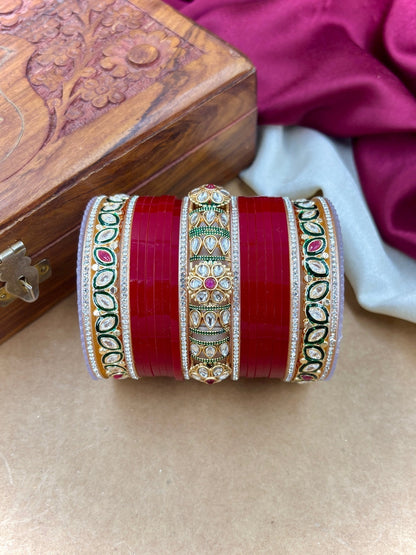 Ishhaara Red Kundan Bangle Set - a stack of red and gold bangles with intricate designs