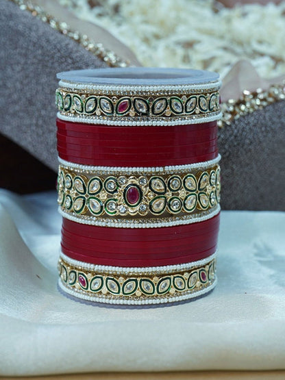 Ishhaara Red Kundan Bangle Set - a stack of red and gold bangles with intricate Kundan designs
