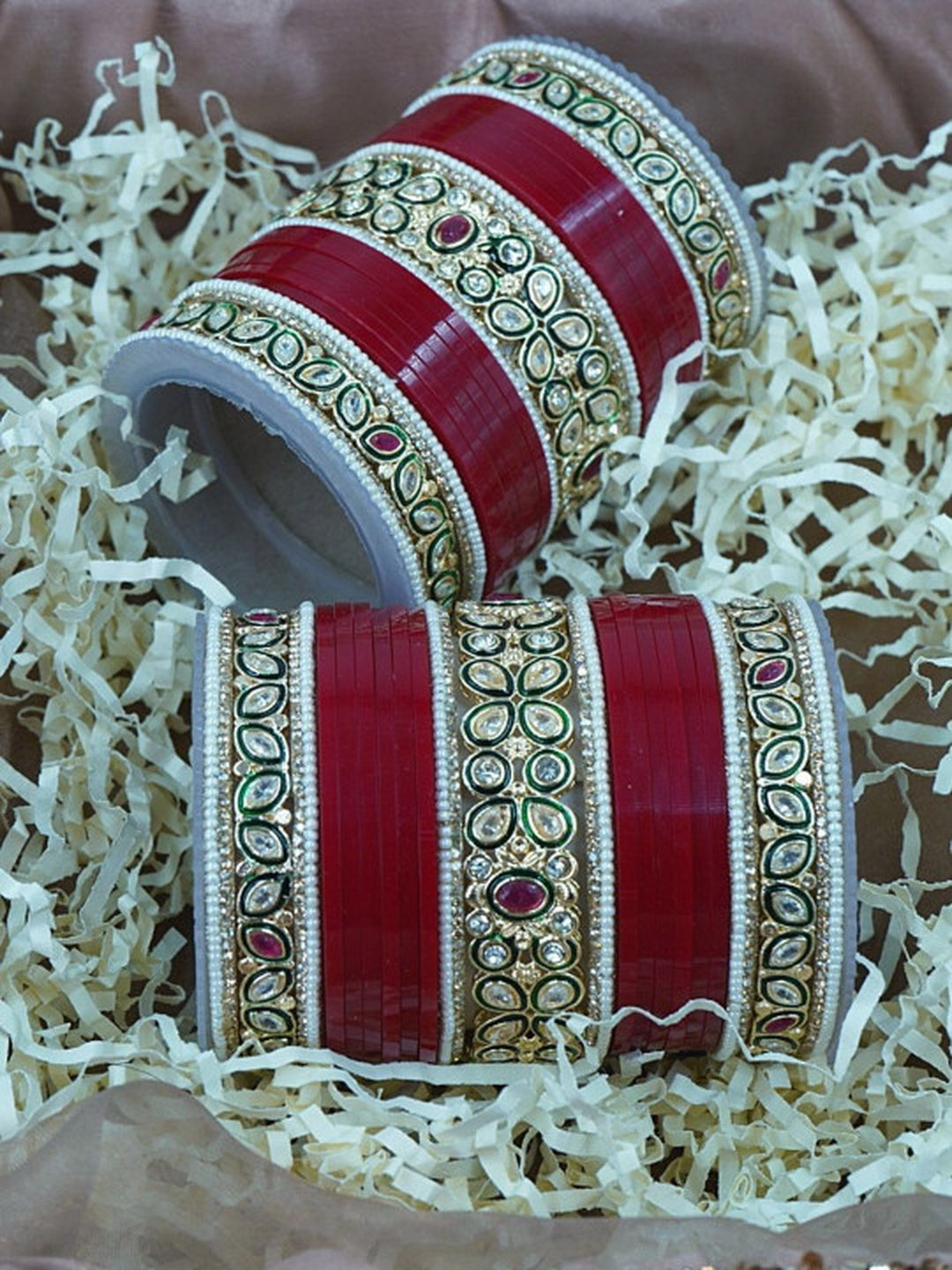 Ishhaara Red Kundan Bangle Set - a stack of red and gold bangles with intricate Kundan designs - view 5