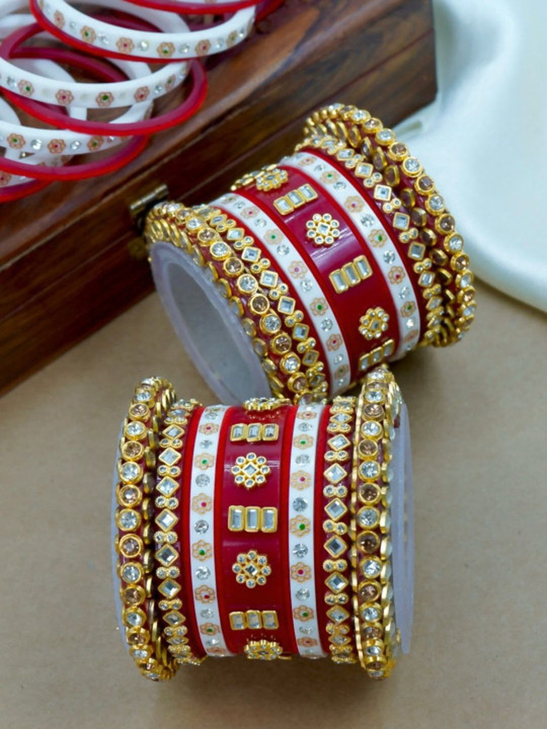 Ishhaara Red Kundan Bangle Set - traditional Indian jewelry with intricate designs and premium stones