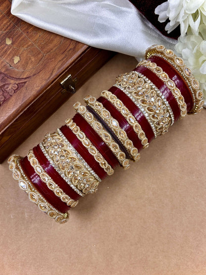 Ishhaara Red Kundan Bangle Set - a stack of red and gold bangles with intricate designs - view 4
