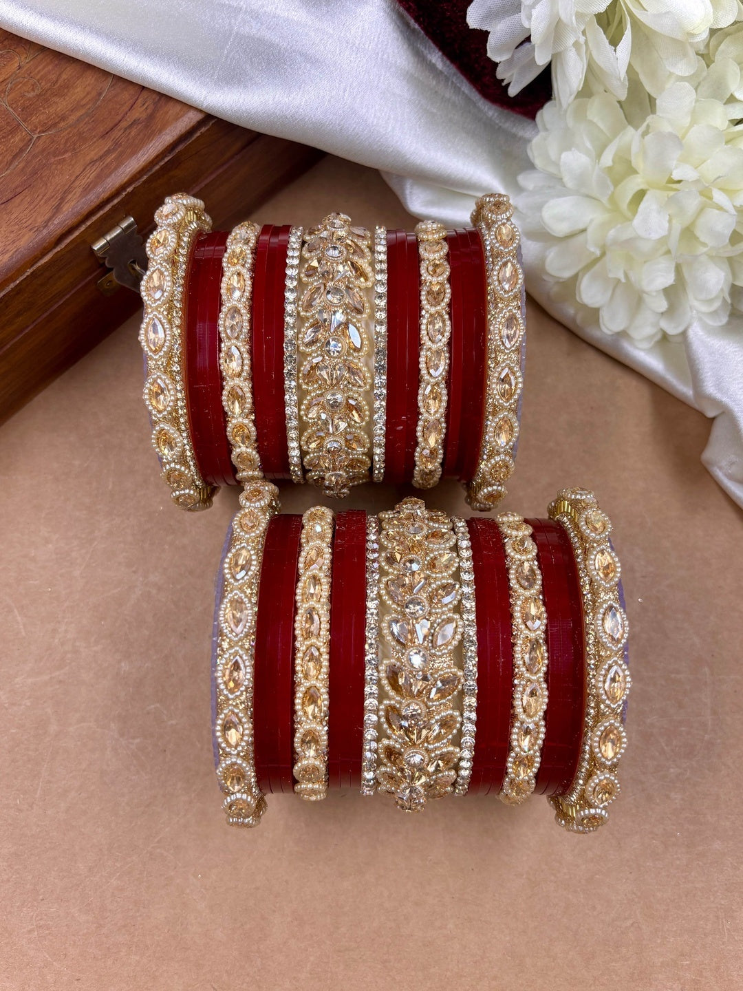 Ishhaara Red Kundan Bangle Set - a stack of red and gold bangles with intricate designs - view 6