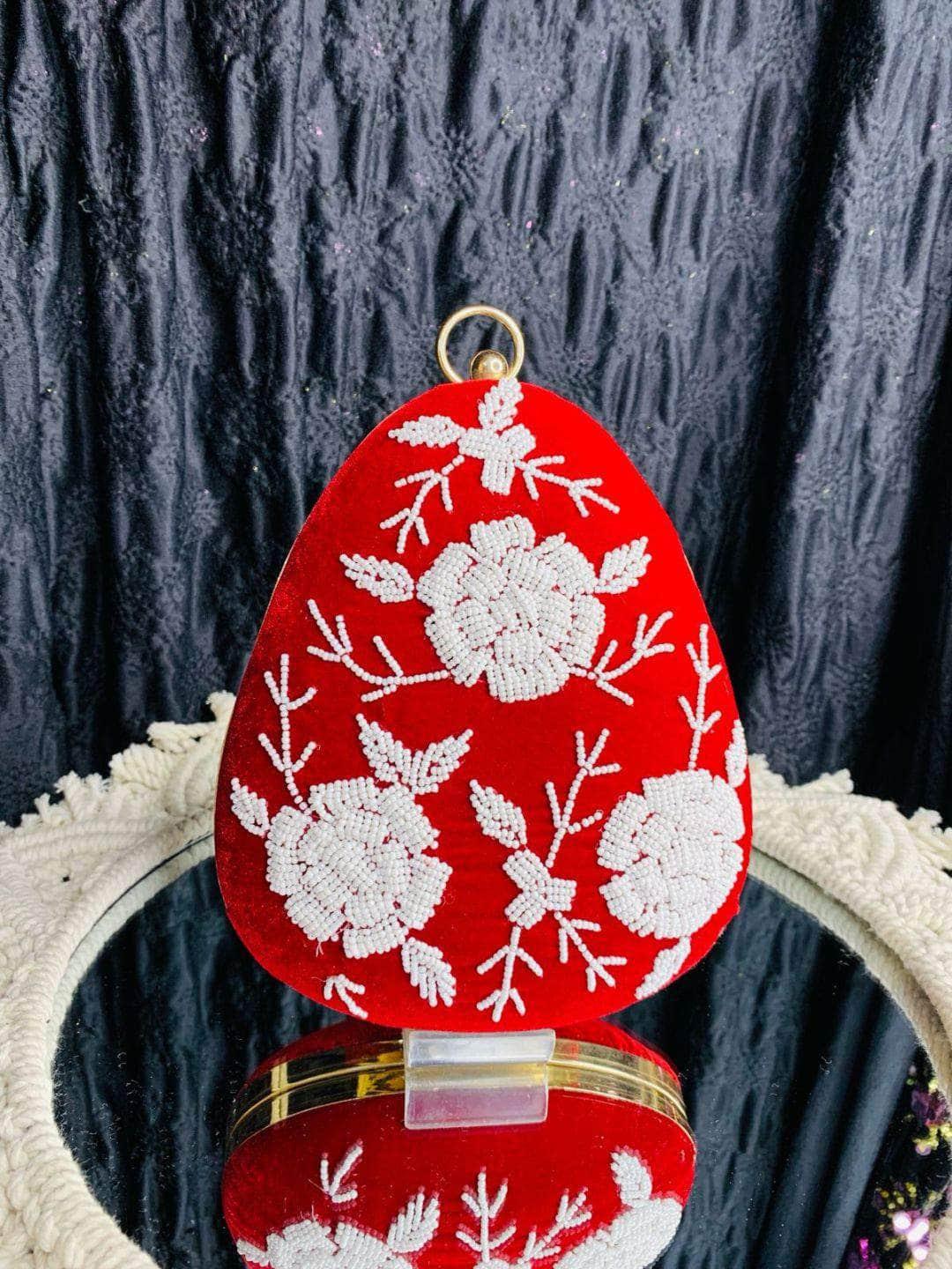 Ishhaara Large Egg Shaped Pearl Studded Bags