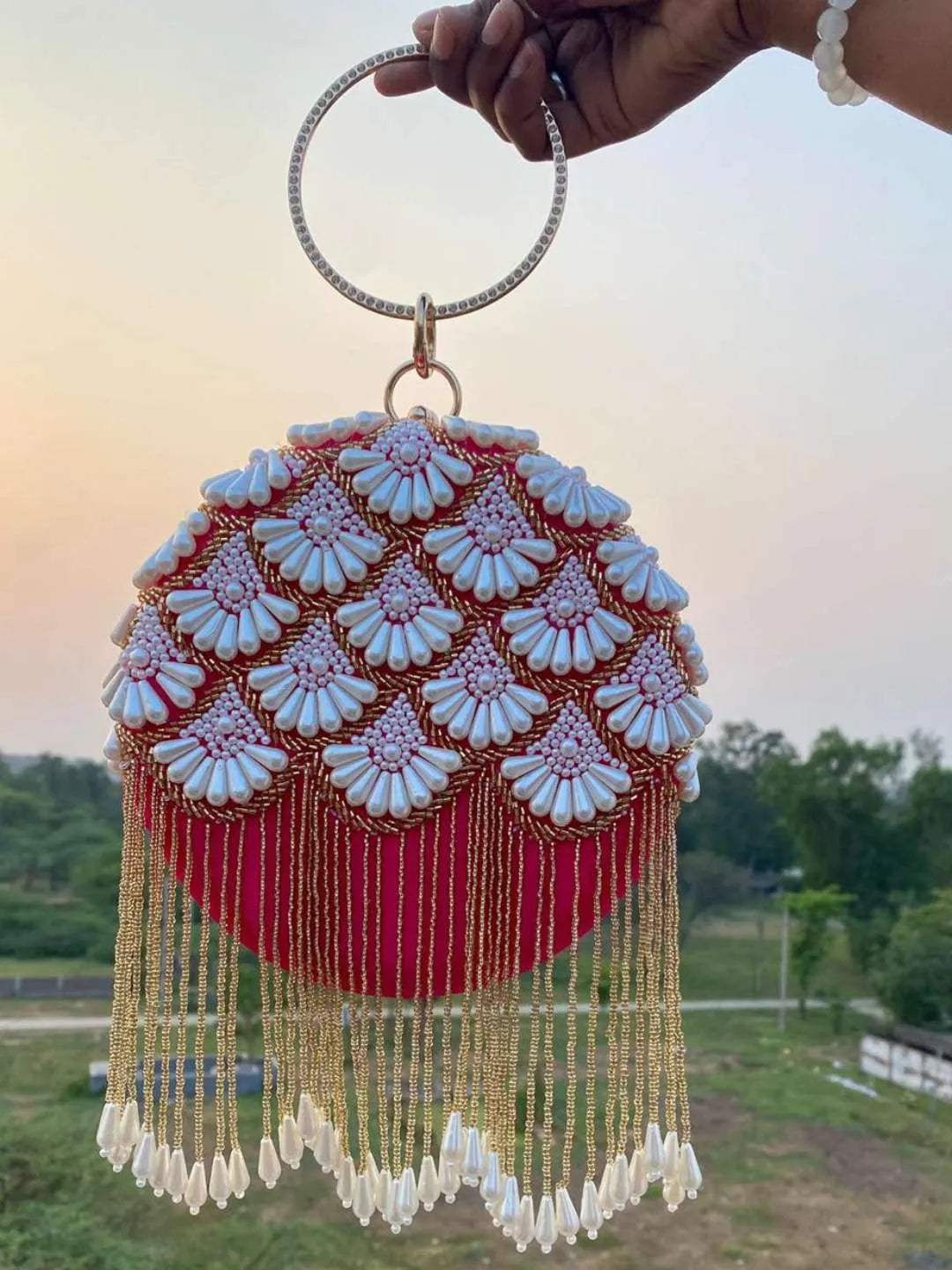 Ishhaara Red Matka Embroidered Design In Round Clutch