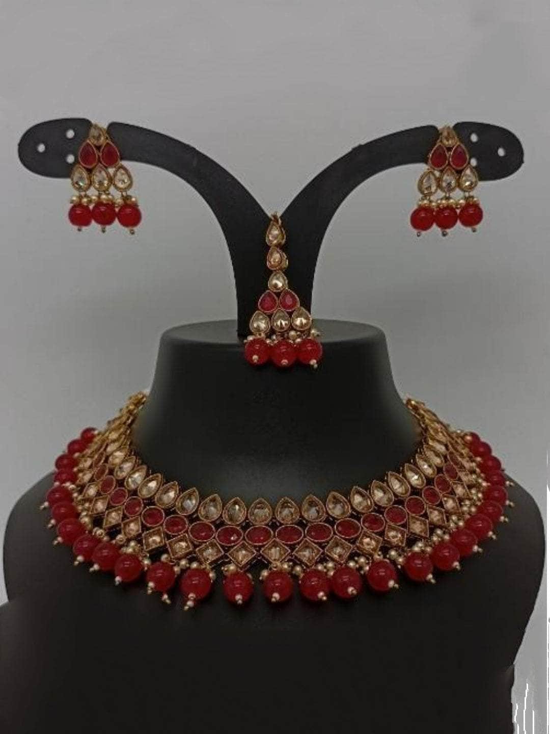 Ishhaara Red Reverse AD Colored Stone Choker Earring And Teeka Set