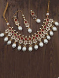 Ishhaara Red Stephanie Timmins in AD Kundan Drop Pearls Necklace Set