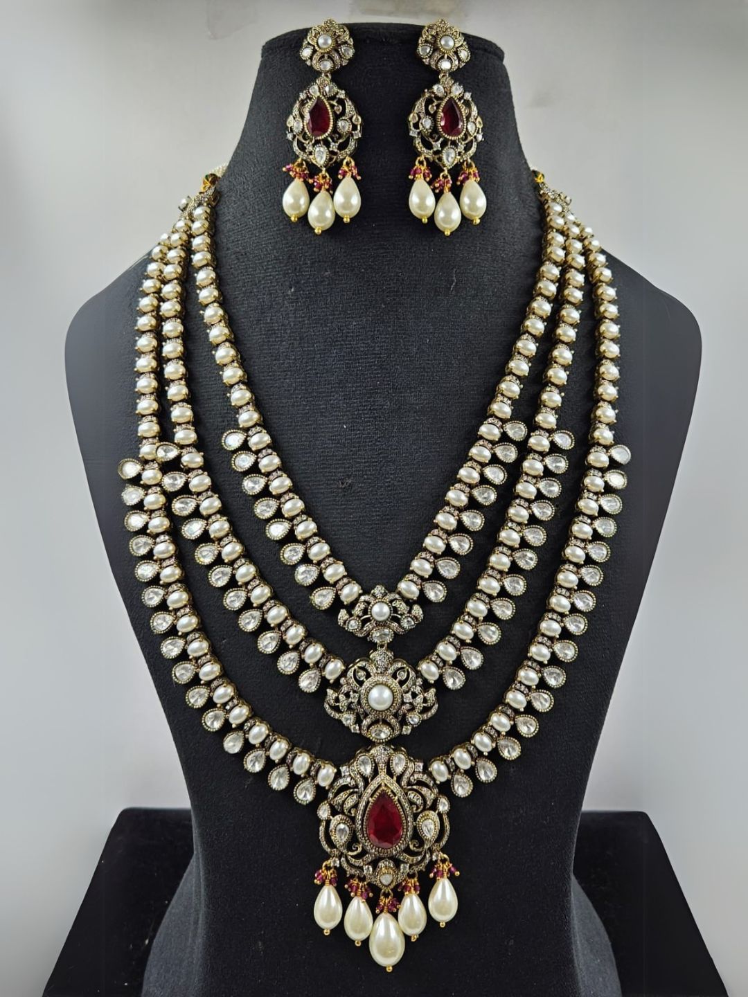 Ishhaara Red Traditional Multi Layered Multi Colored Necklace Set