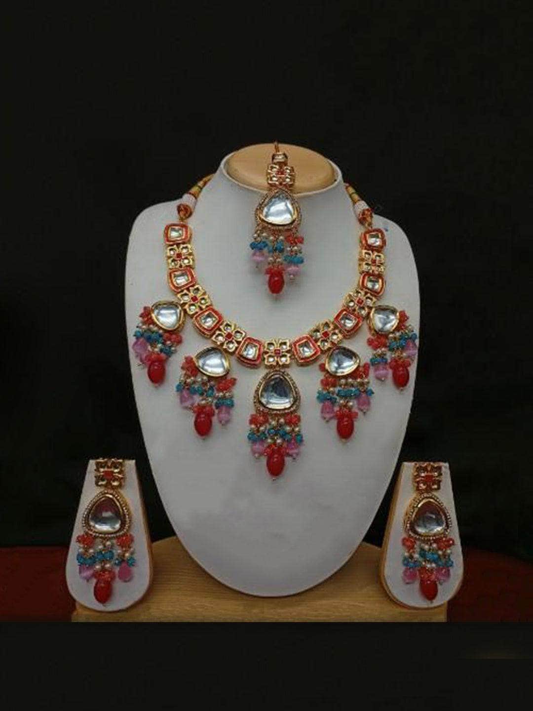Ishhaara Red Triangular Hanging Kundan Necklace Earring And Teeka Set