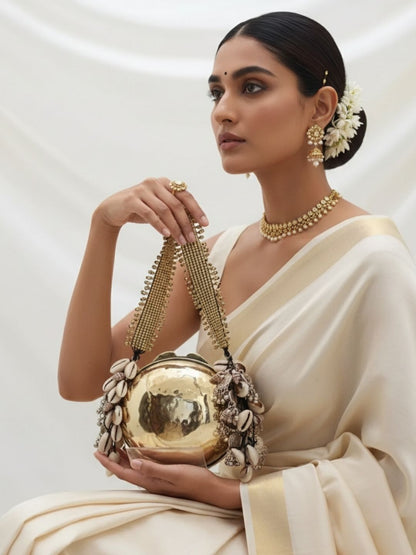 ishhaara-round-banjara-metal-clutch-30753287485912