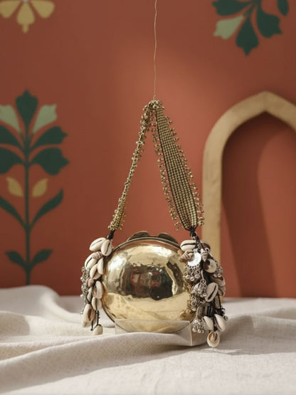 Ishhaara Round Banjara Metal Clutch