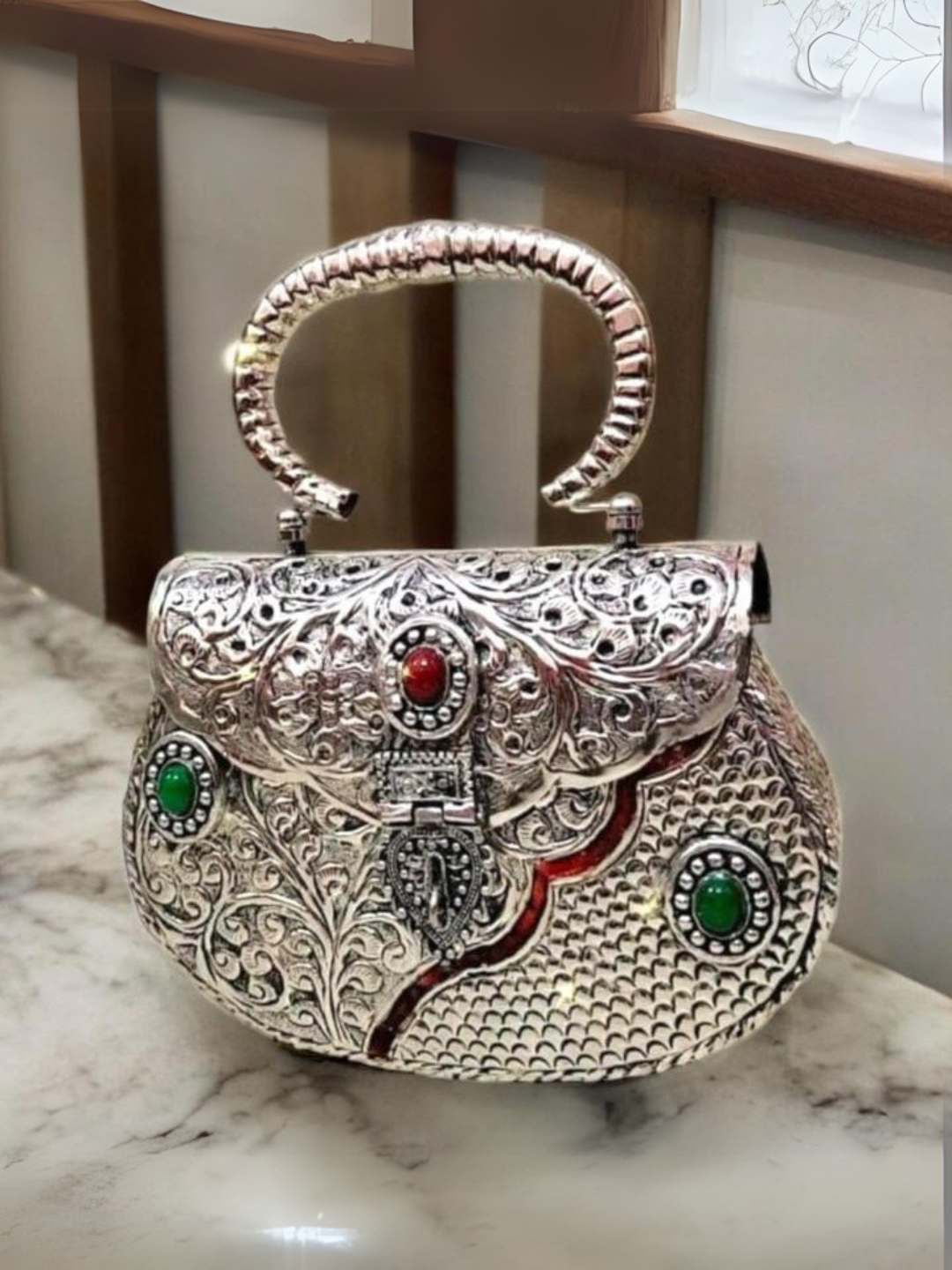 Ishhaara Royal Handcrafted Stone Embedded Brass Clutch